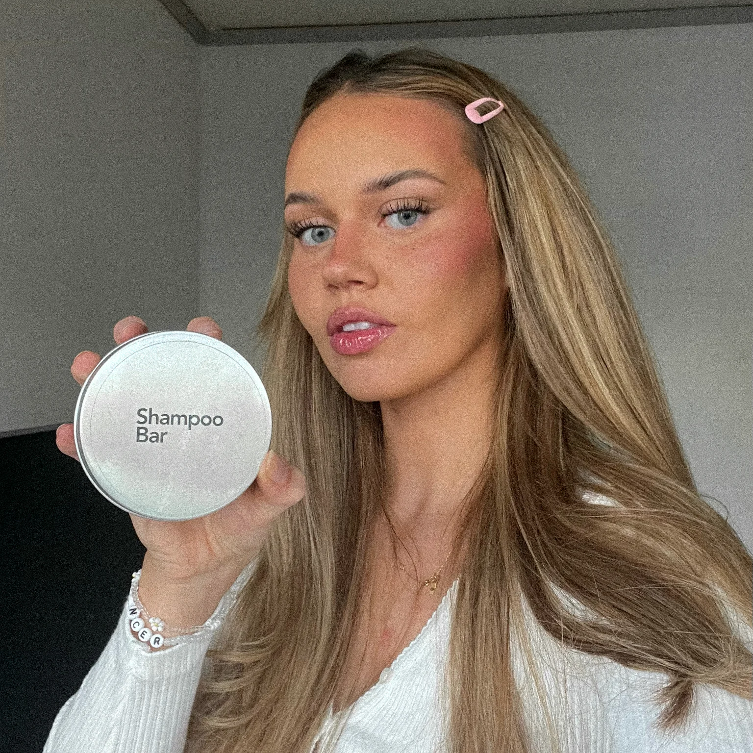 Creator holding URBANGREENARY Shampoo Bar