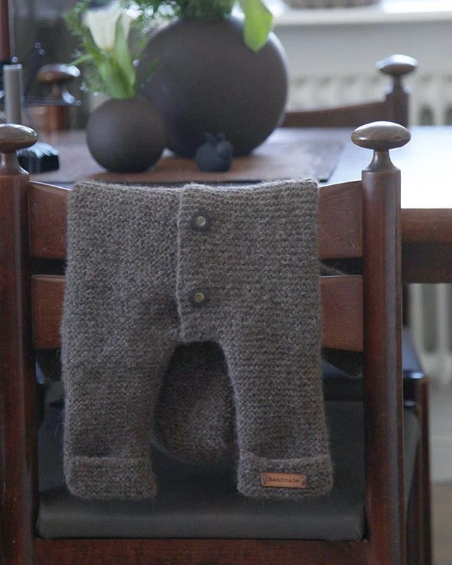 Soap bottle and textiles in a home interior