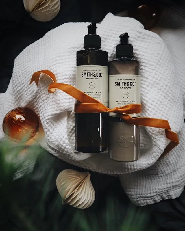 Body care bottles wrapped with ribbon