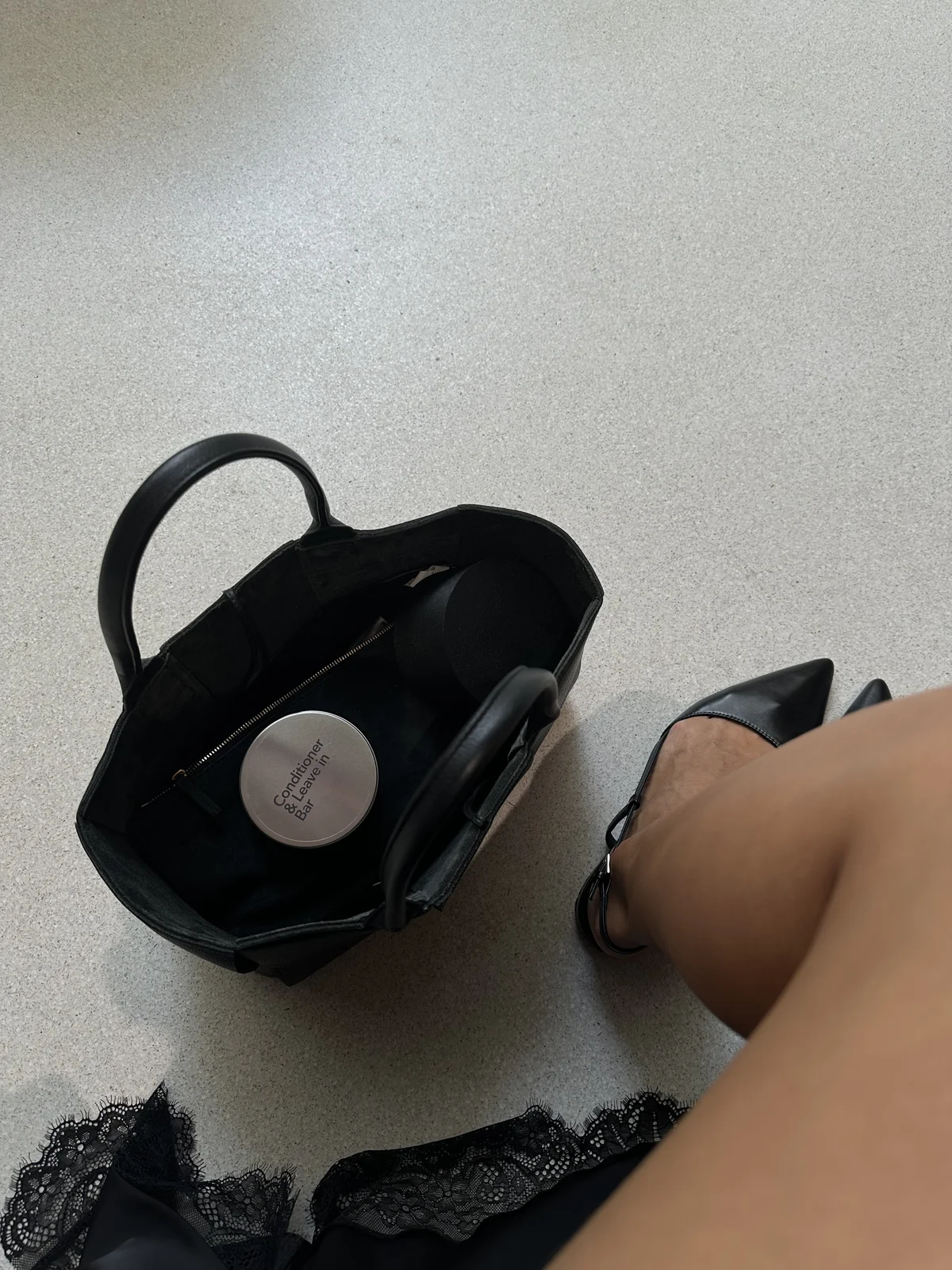 Conditioner bar packed in a black handbag