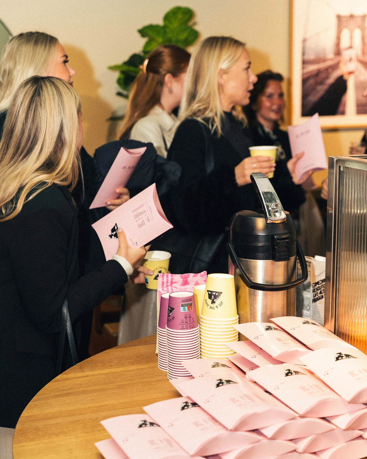 Guests mingling over breakfast at Joe & The Juice.