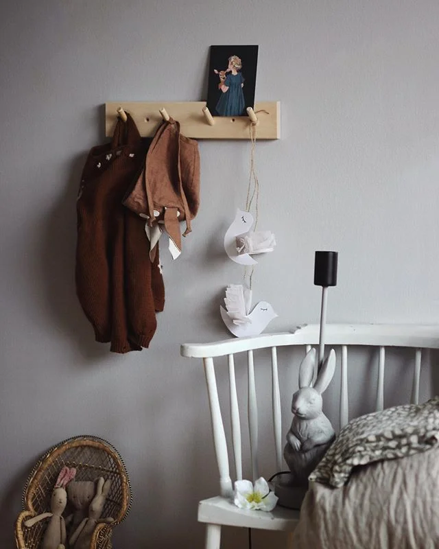 Home interior with wall storage and a chair
