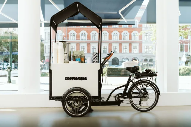 The Coffee Club coffee bike in the Polestar showroom.