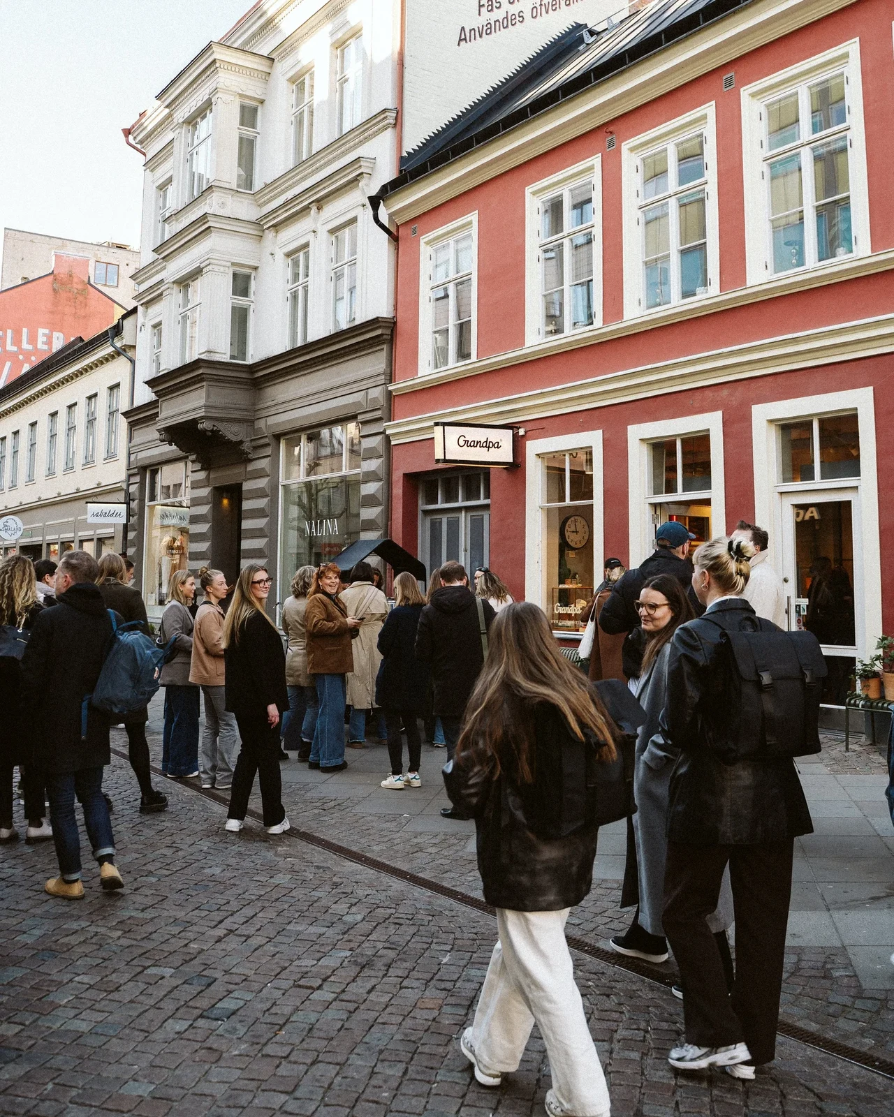 Guests meeting outside Grandpa Store.