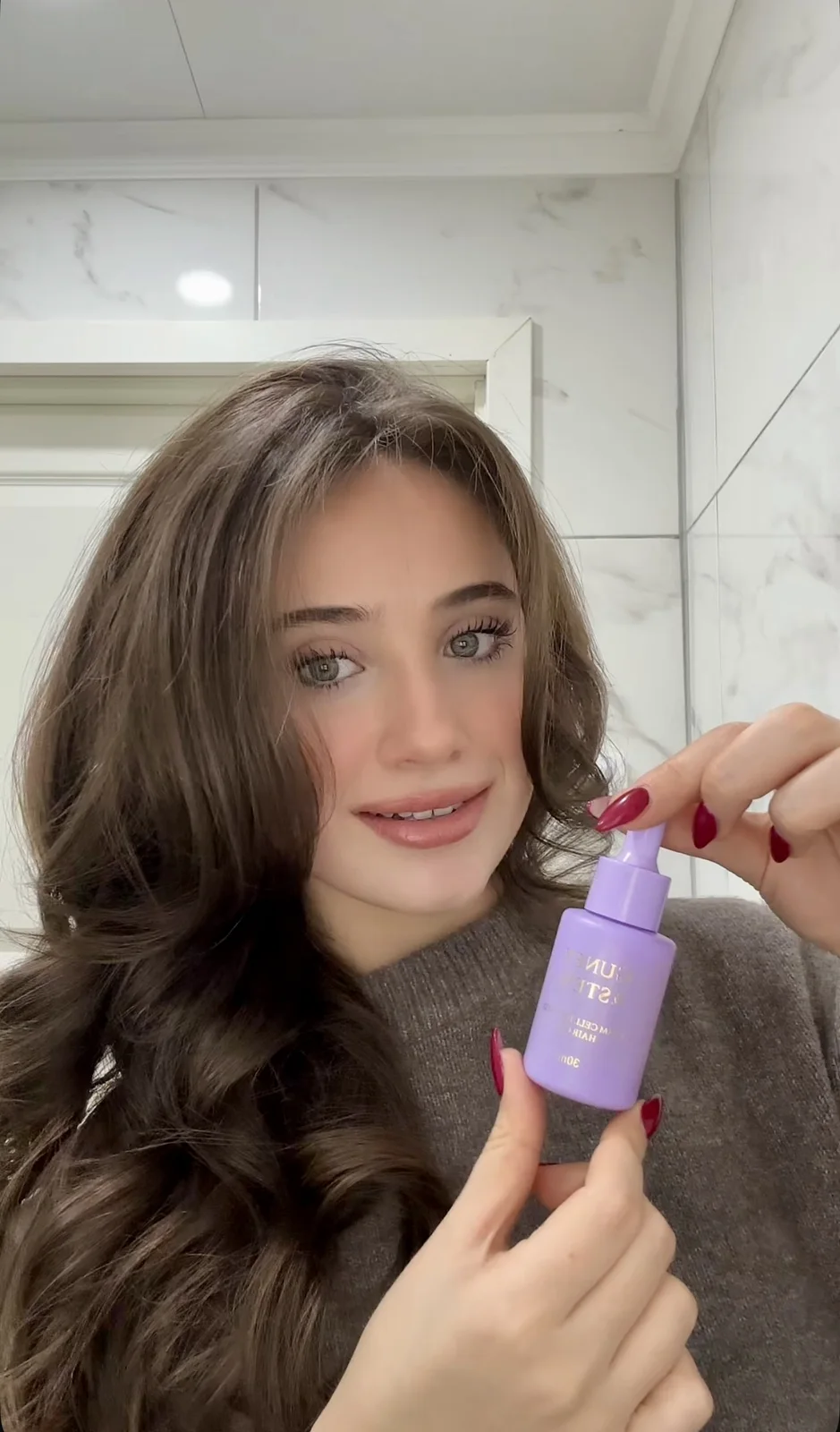 Creator opening Guney & Stem hair oil