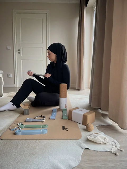 Creator using resistance bands at home