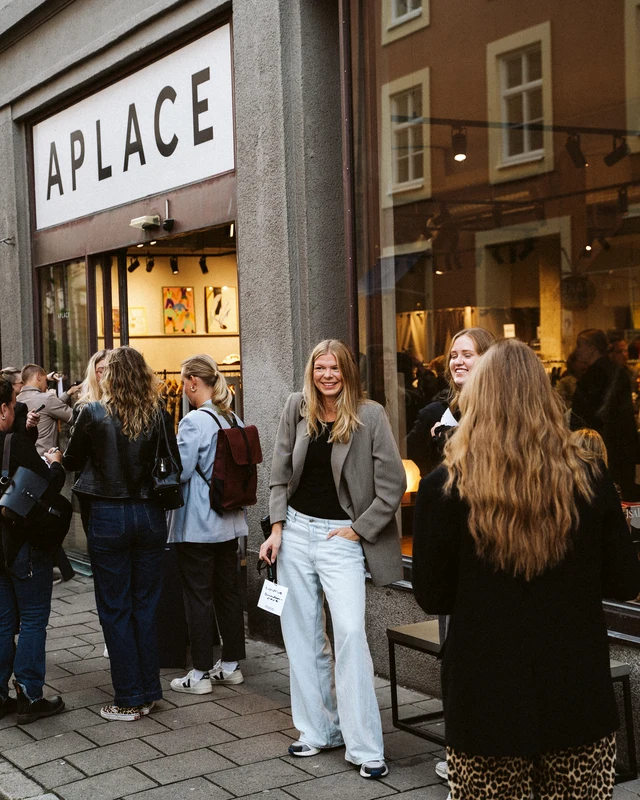 Guests mingling outside APLACE.