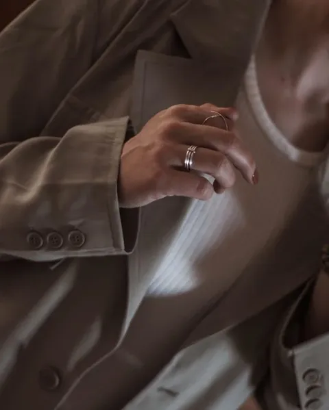 Detail of a necklace and jacket