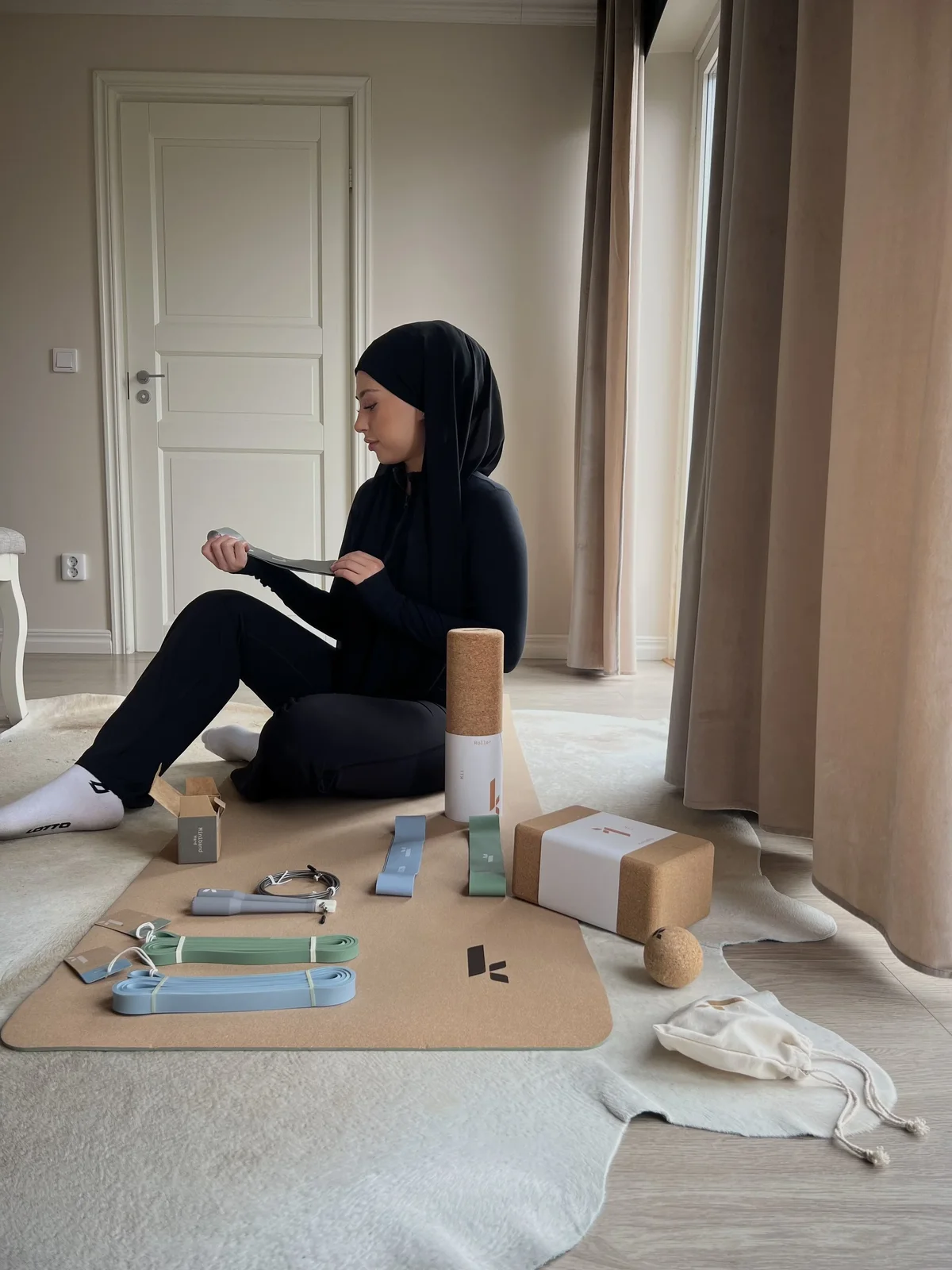 Creator using resistance bands at home