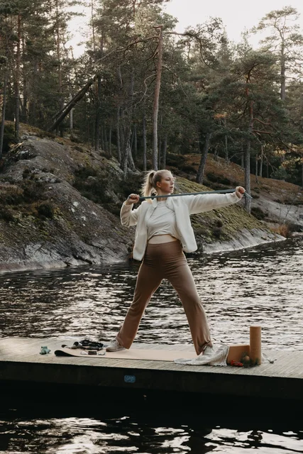 Creator training outdoors by the water