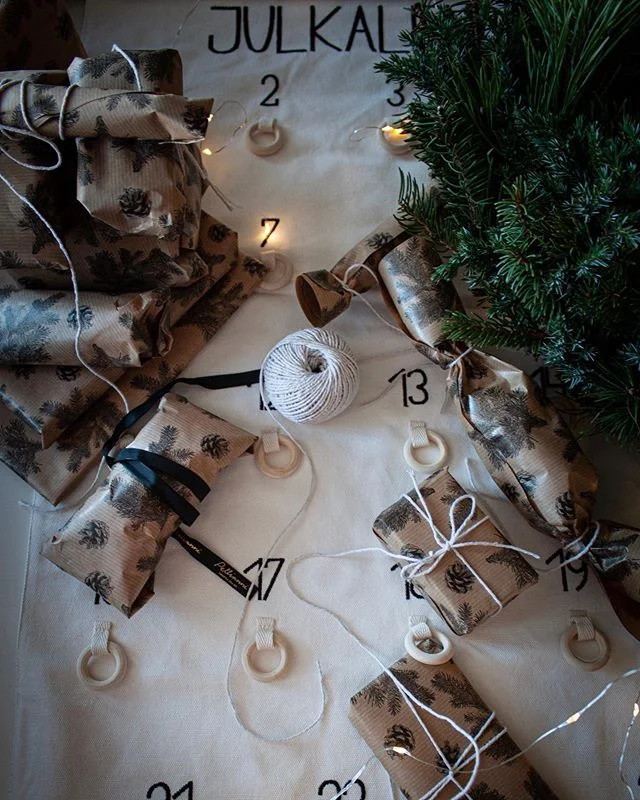 Advent calendar beside greenery